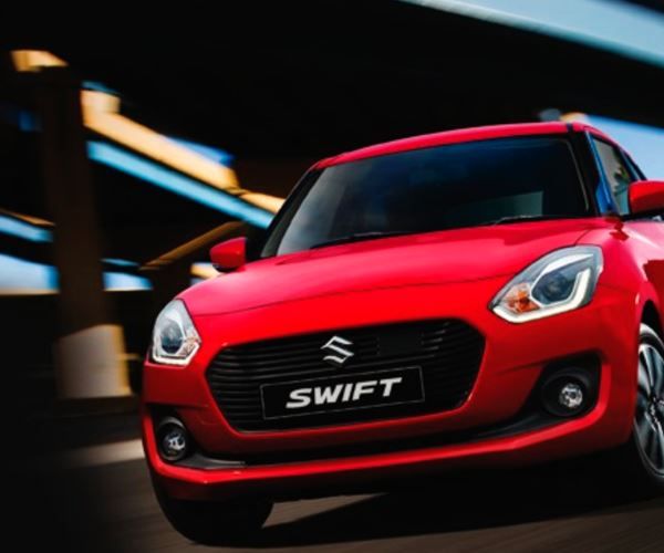 Suzuki Swift blanche, citadine de location à l'île Maurice